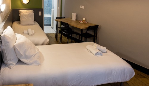 Habitación triple clásica, varias camas