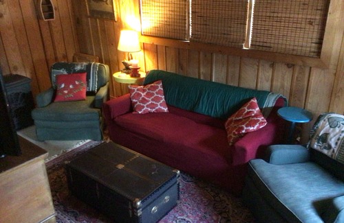 Lynn Cabina | Cozy Lake House retreat with beautiful fall foliage.