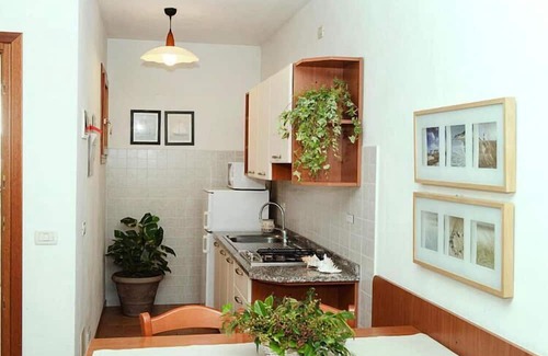 Bibione Lido del Sole Apartamento | Terraced house in the Ca' del Pino holiday complex with communal pool in Bibione