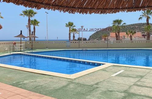 Puerto de Mazarrón Apartamento | Accessible apartment 50 metres to beach ,large communal pool, sea view balcony