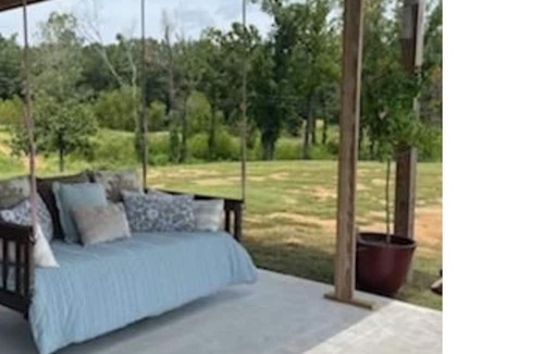Negreet Casa | RV Cover with entertaining patio and additional storage area at Toledo Bend Lake
