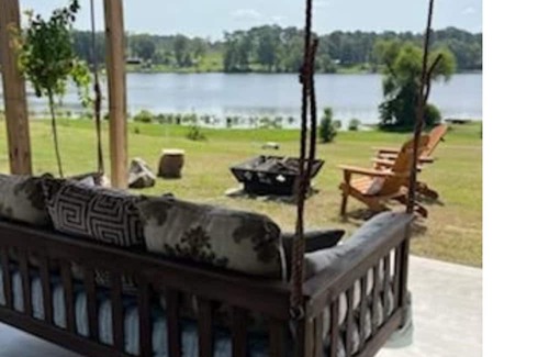 Negreet Casa | RV Cover with entertaining patio and additional storage area at Toledo Bend Lake