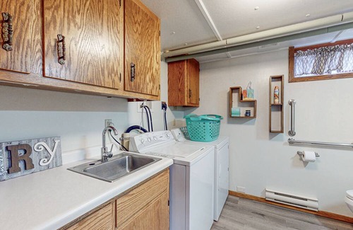 Hazelhurst Casa | Lakefront home with large patio, fire pit, air hockey & a provided peddle boat