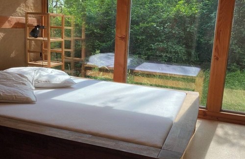 Huy Casa | Tiny house in a large natural garden
