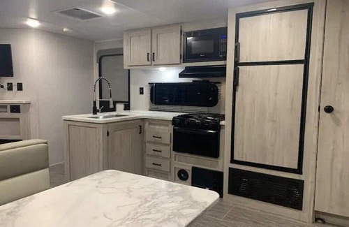 Calhoun Casa | Modern RV on a Regenerative Homestead with access to large creek. Pet-Friendly!