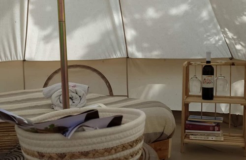 Arpino Casa | 12 m2 tent equipped with a comfortable French double bed, with an internal space to relax in. The ex