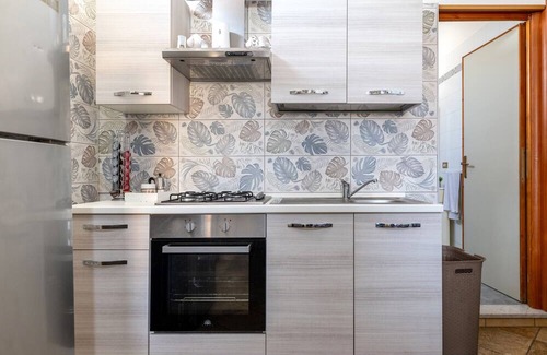 Torre Ovo Apartamento | Apartment 'Casa Vacanze Le Barche Due' with Private Terrace and Air Conditioning