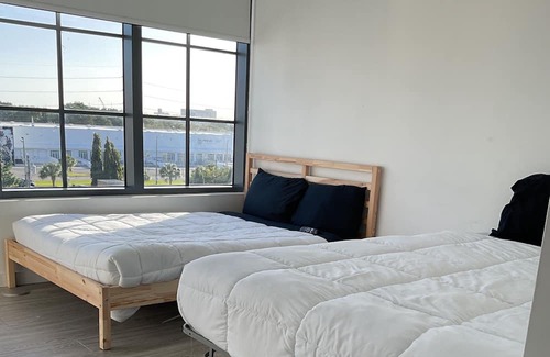 Wynwood Art District Condominio | Luxury family sized condo.Restaurants and shopping right outside your door.