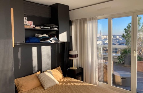 Combat Apartamento | Rooftop, panoramic view of Paris.