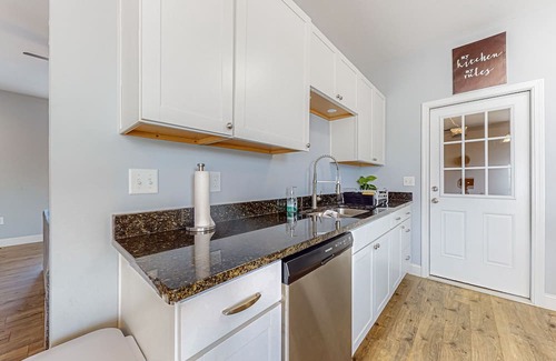 Jefferson City Casa | Modern dog-friendly home with enclosed yard, pool, grill, mtn views, W/D, & AC