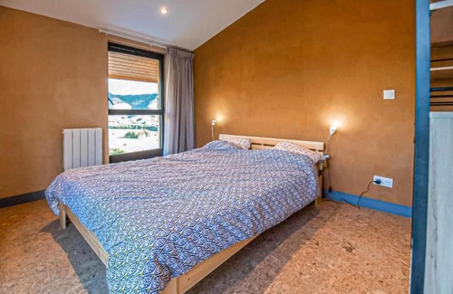 Marcoux Apartamento | This beautiful and modern vacation home welcomes you with a breathtaking mountain view.