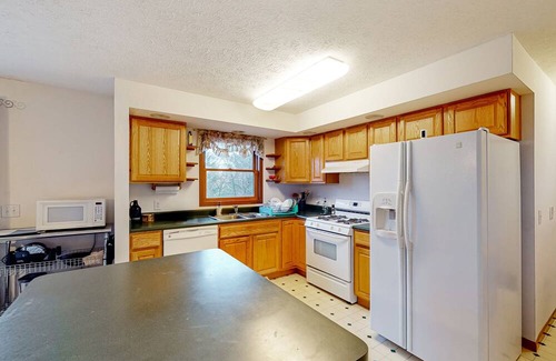 Cheboygan Cabaña | Lakefront stay with two kayaks, jetted tub, wood stove, & W/D - dog-friendly
