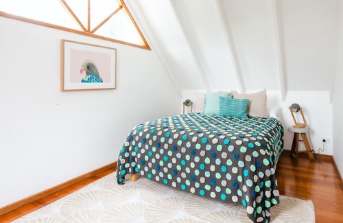 Cape Schanck Casa | Rosemary Cottage - you'll be greeted by a sprawling lawn and a canopy of mature trees.
