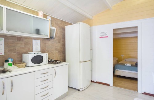 Oliva Casa | Vacation Home "Flashdance" near Beach with Shared Pool & Wi-Fi