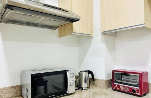 Kapitolyo Apartamento | Ace Suites by the WaterSpa - Twin 1BR Family Room