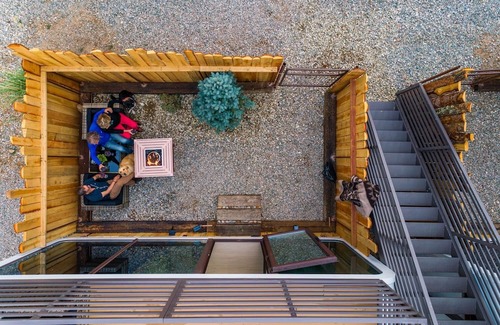 Taos Cabina | LUXX Space Cabin Tiny House with rooftop deck, private fenced patio.