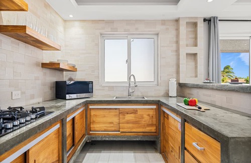 Ponton Apartamento | Spacious 2BR Aruba Home with a Pool, BBQ, Full Equipped Kitchen & Gated Backyard