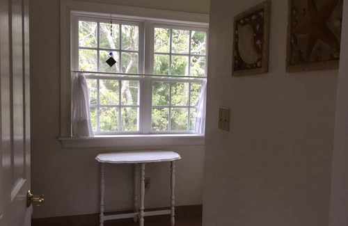 Cape May Point Casa | Pristine, Cozy, 4 bedroom Beach Cottage with a 40 foot screened in front porch!