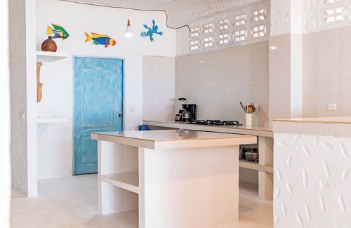 Rincon Apartamento | Spacious beachfront house in Rincón del Mar, white, comfortable, fresh and bright.
