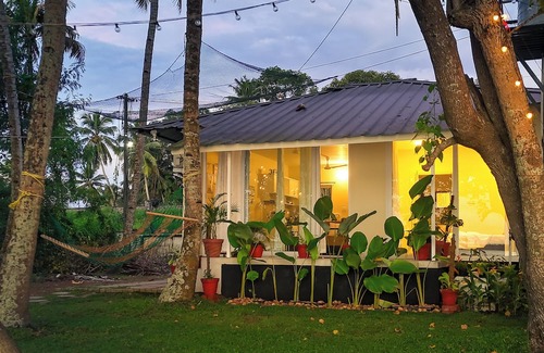 Munroe Island Cabaña | Tropical Haven - 1BR Lakefront AC Cottage with Stunning Lakeview & Lake Access