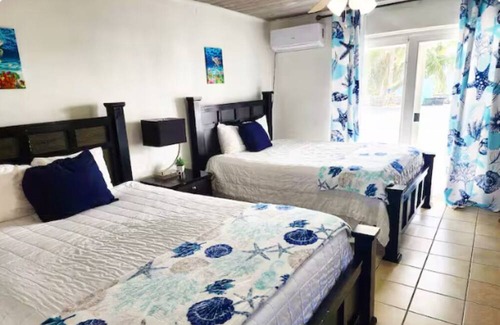 Farmer's Hill Complejo | Double Queen Suite at Exuma Palms Resort - Conch