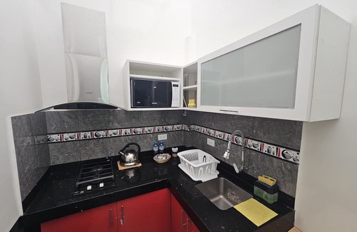 Los Cedros Apartamento | Fully equipped studio with kitchen; ideal for long stays.