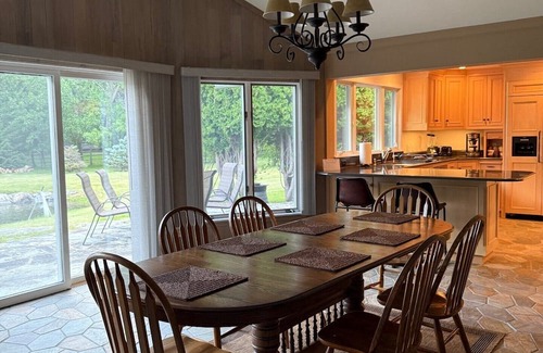 Lakeside Casa | Private Flathead Lake lagoon and dock, enjoy a spacious 5-bedroom Lakeside home.