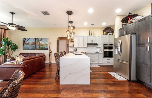 Tropic Palms Casa | Waterfront Getaway! 3BR on Canal + Row Boat – Near Beach & Atlantic Ave Fun!