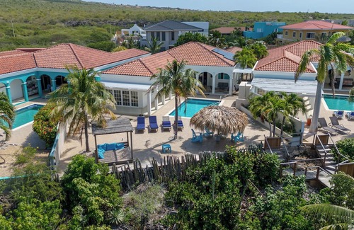 Sabadeco Casa | Crown Ridge 12 – Oceanfront home with private pool & infant of a dive site