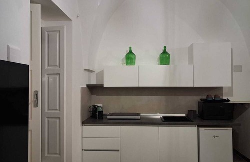 Capitolo Casa | The White Apple