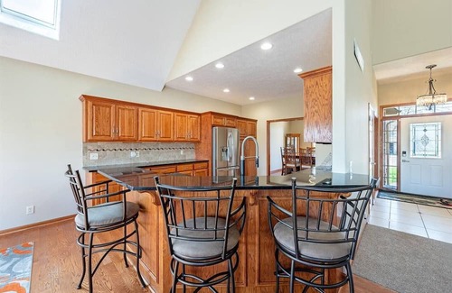 Carter Lake Casa | 5 bed 3 miles to downtown Omaha and CWS. Hot Tub, Pool Table & Dart Board