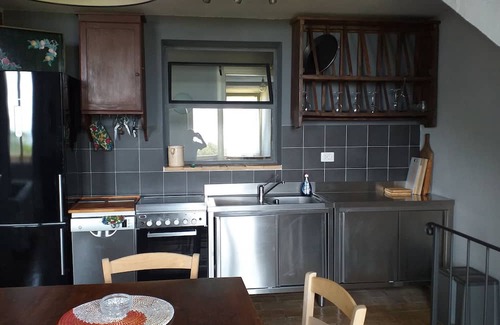 Magliano in Toscana Apartamento | Farmhouse in the countryside with magnificent sea view, ideal for families with 4 paws