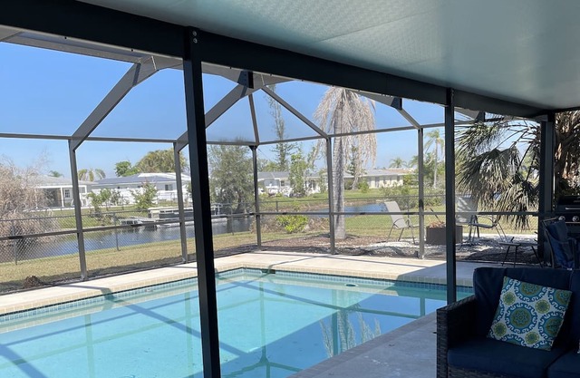Canal Home near Golf Course . 20x32 Heated Pool.15 MIN To BEACHES
