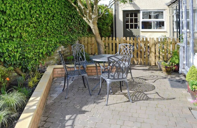 Tucked within a peaceful courtyard of four yet only a few yards from the River Coquet in Warkworth.