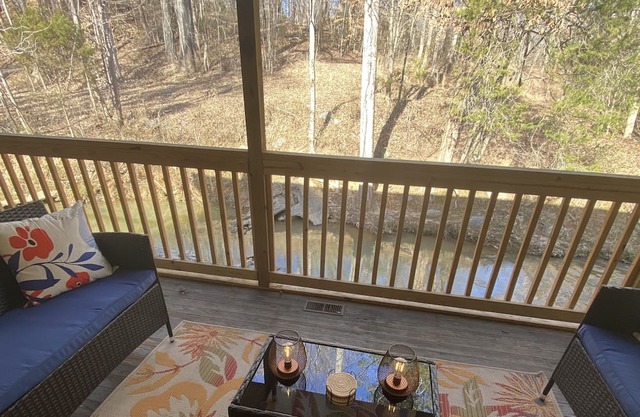 A serene hideaway nestled by the babbling brook and only minutes to downtown!
