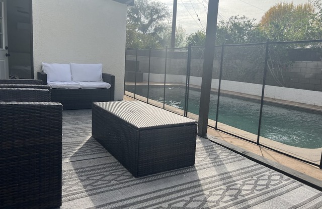 Lake Balboa gated corner lot with large pool and yard