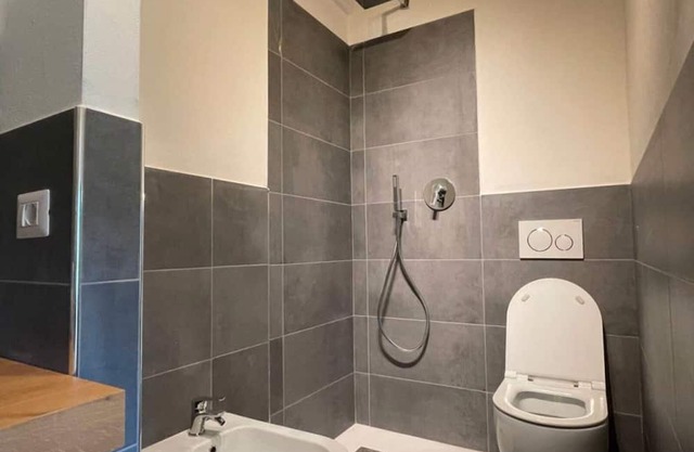 Apartamento 'Leccio' con piscina compartida y Wi-Fi
