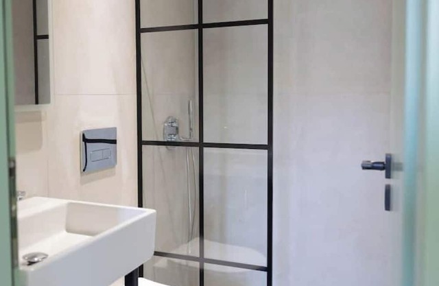 Chic Warehouse Loft in Central Saranda – Walk to Port & Promenade!