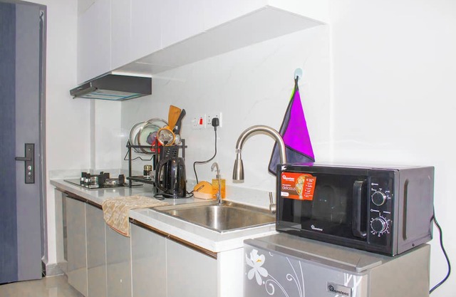 Cozy studio with WiFi and fitness room in charming Pridelands Family friendly