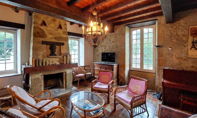 Conchez-de-Bearn Casa | Enjoy a relaxing break close to nature in this inviting vacation home.