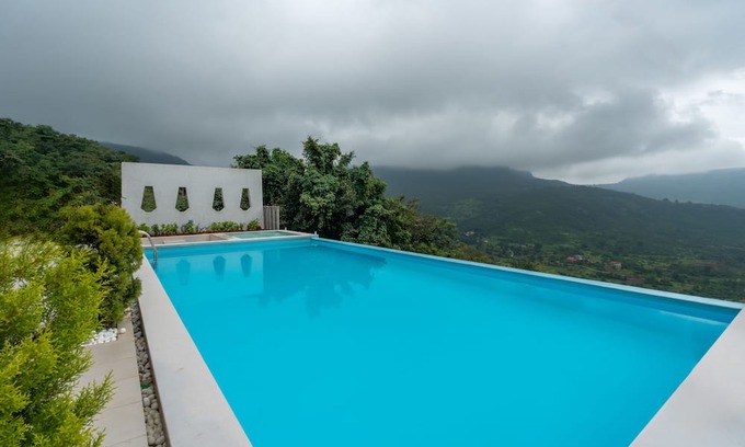 Kadadhe Villa | 5BHK Green Atlas Villa with Infinity Pool, Turf, Games and Theatre