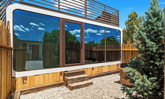 Taos Cabina | LUXX Space Cabin Tiny House with rooftop deck, private fenced patio.