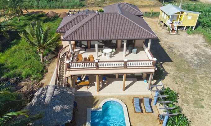 Río Sittee Villa | Spectacular Oceanfront 3/3 Villa with Private Beach, Pool, and Dock