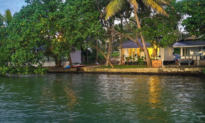Munroe Island Cabaña | Tropical Haven - 1BR Lakefront AC Cottage with Stunning Lakeview & Lake Access