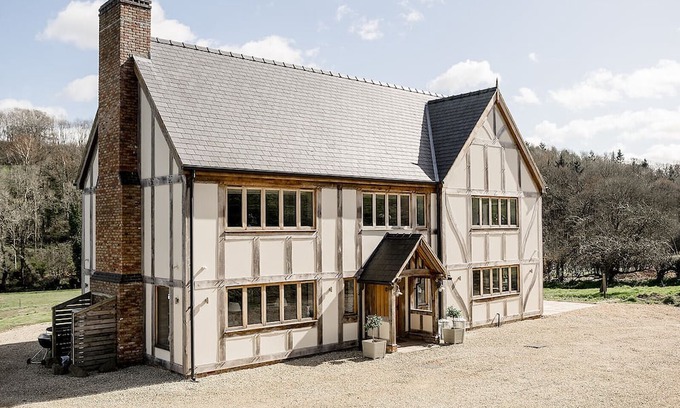 Acrefair Casa | A luxurious riverside cottage with stunning views, a hot tub, and fishing access.